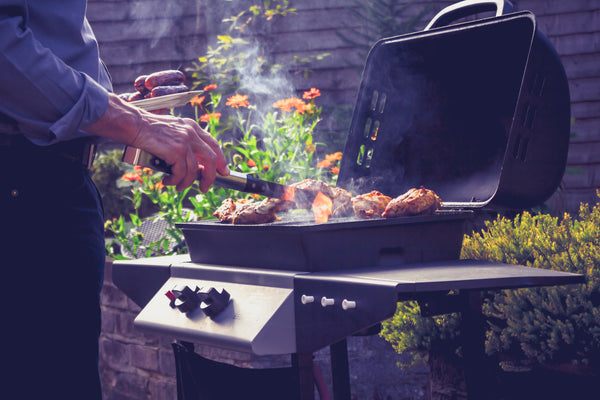 MEAT GRILLING ON BBQ