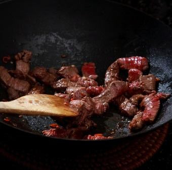 Quick frozen un-aged grass fed beef steak stir-fry strips